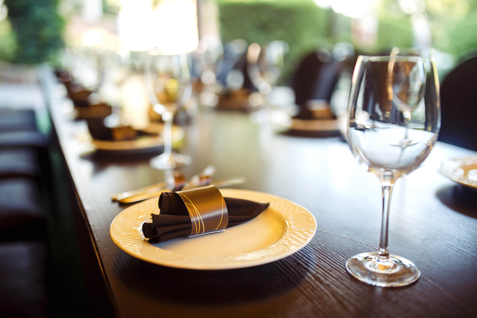 sparkling-glassware-stands-on-long-table-prepared-2023-11-27-04-50-35-utc.jpg